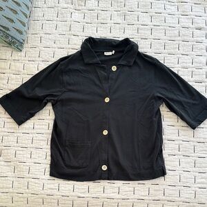 TOAST Navy 3/4 sleeve button up with pocket on lower right side.